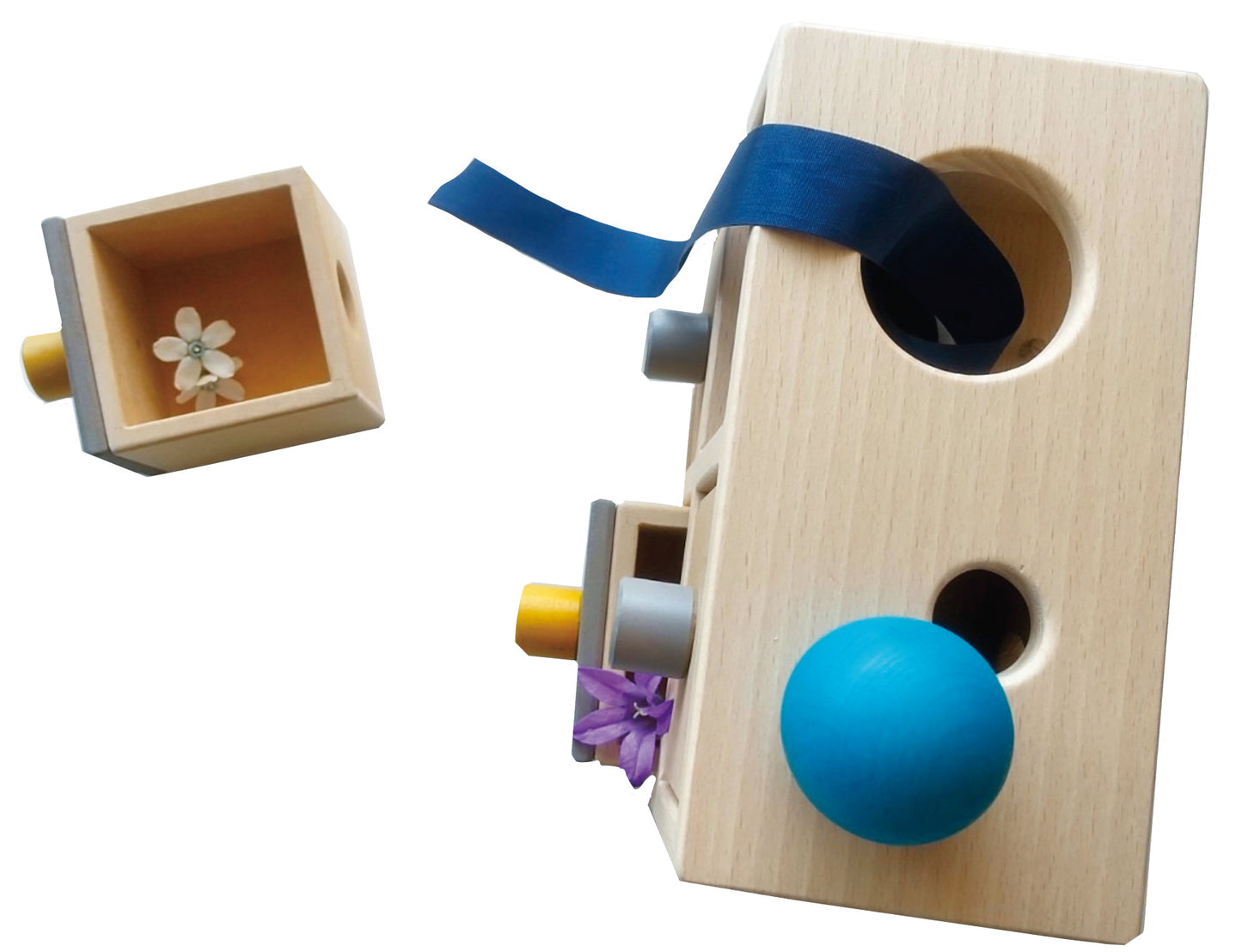 小さな太陽シリーズクリエイティブ・チェストの引き出しに花が入っている